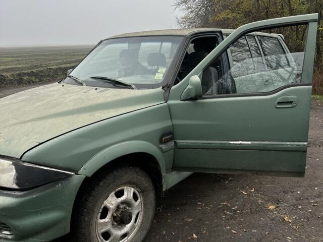 Зеленый Cанг Йонг Другая, объемом двигателя 2.4 л и пробегом 200 тыс. км за 1419 $, фото 1 на Automoto.ua