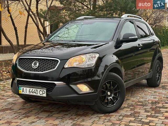 Черный Cанг Йонг Корандо, объемом двигателя 2 л и пробегом 168 тыс. км за 7200 $, фото 1 на Automoto.ua