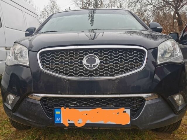 Черный Cанг Йонг Корандо, объемом двигателя 2 л и пробегом 350 тыс. км за 7000 $, фото 1 на Automoto.ua