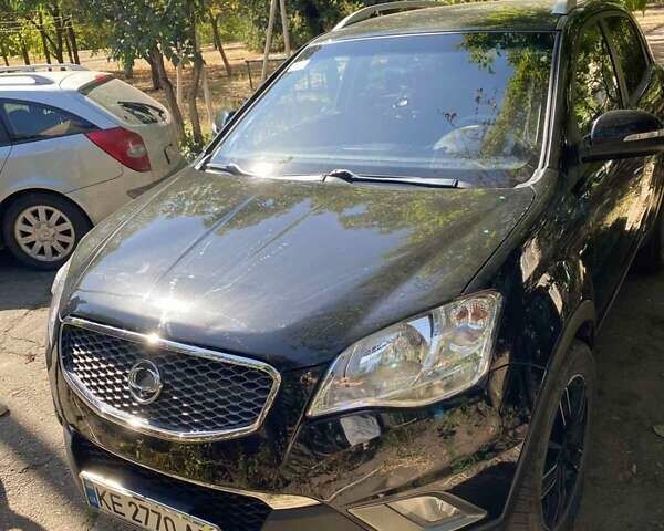 Черный Cанг Йонг Корандо, объемом двигателя 2 л и пробегом 194 тыс. км за 6000 $, фото 1 на Automoto.ua