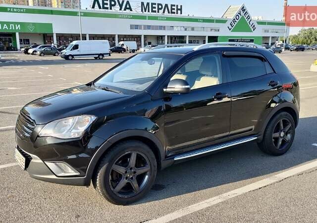 Черный Cанг Йонг Корандо, объемом двигателя 2 л и пробегом 168 тыс. км за 9099 $, фото 1 на Automoto.ua