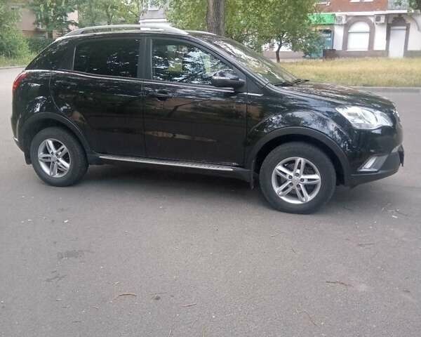Черный Cанг Йонг Корандо, объемом двигателя 2 л и пробегом 122 тыс. км за 9300 $, фото 1 на Automoto.ua