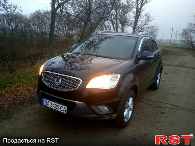 Черный Cанг Йонг Корандо, объемом двигателя 2 л и пробегом 316 тыс. км за 8800 $, фото 1 на Automoto.ua