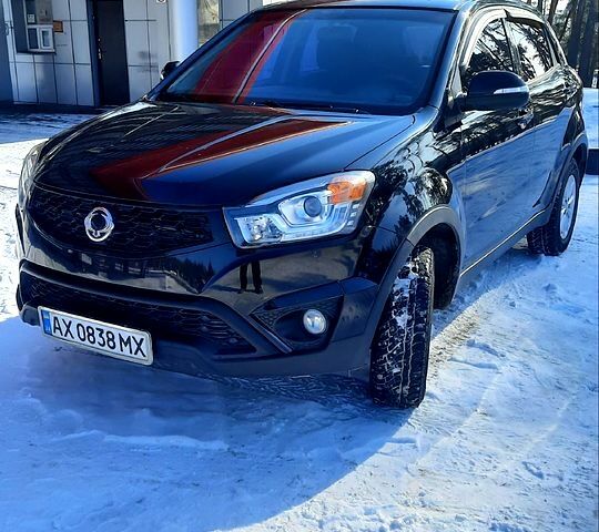 Черный Cанг Йонг Корандо, объемом двигателя 2 л и пробегом 95 тыс. км за 10600 $, фото 1 на Automoto.ua