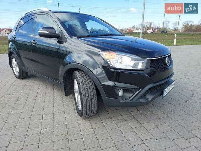 Черный Cанг Йонг Корандо, объемом двигателя 2 л и пробегом 163 тыс. км за 10599 $, фото 1 на Automoto.ua