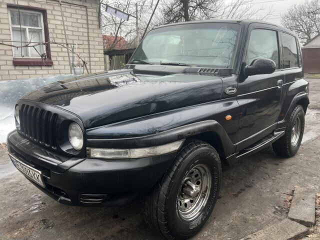 Синий Cанг Йонг Корандо, объемом двигателя 2 л и пробегом 300 тыс. км за 4000 $, фото 1 на Automoto.ua