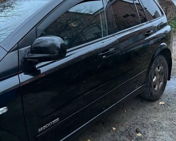 Черный Cанг Йонг Кирон, объемом двигателя 2 л и пробегом 126 тыс. км за 12500 $, фото 1 на Automoto.ua