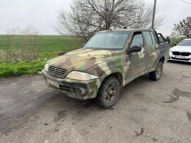 Бежевый Cанг Йонг Муссо, объемом двигателя 2.9 л и пробегом 200 тыс. км за 2200 $, фото 1 на Automoto.ua