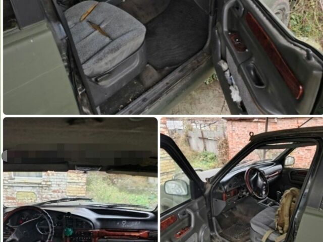 Зеленый Cанг Йонг Муссо, объемом двигателя 0 л и пробегом 320 тыс. км за 2000 $, фото 1 на Automoto.ua