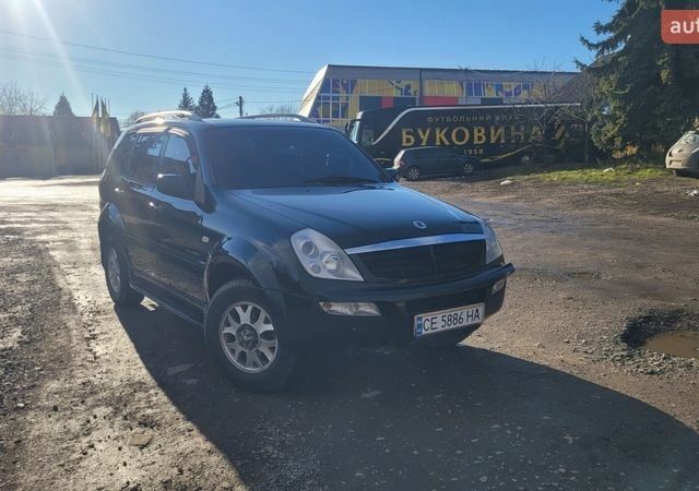 Черный Cанг Йонг Рекстон, объемом двигателя 2.3 л и пробегом 225 тыс. км за 5200 $, фото 1 на Automoto.ua