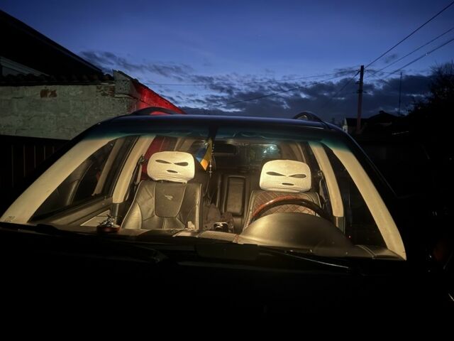 Чорний Cанг Йонг Rexton, об'ємом двигуна 2.7 л та пробігом 352 тис. км за 8000 $, фото 1 на Automoto.ua