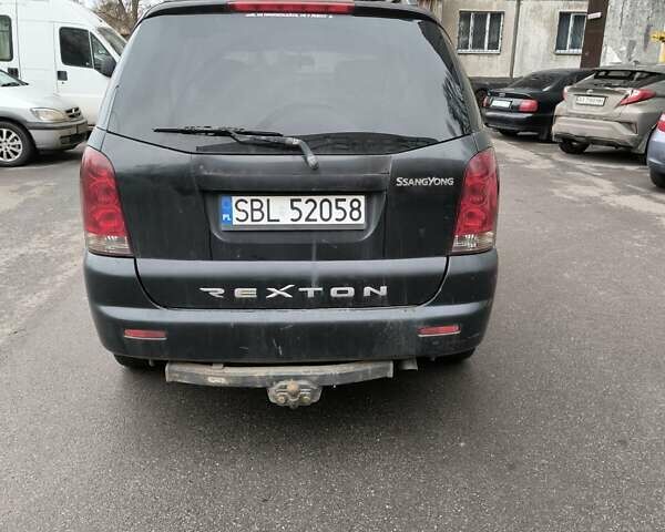 Черный Cанг Йонг Рекстон, объемом двигателя 2.7 л и пробегом 240 тыс. км за 3000 $, фото 1 на Automoto.ua