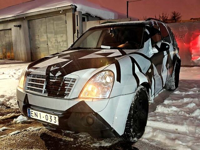 Черный Cанг Йонг Рекстон, объемом двигателя 2.7 л и пробегом 355 тыс. км за 3500 $, фото 1 на Automoto.ua