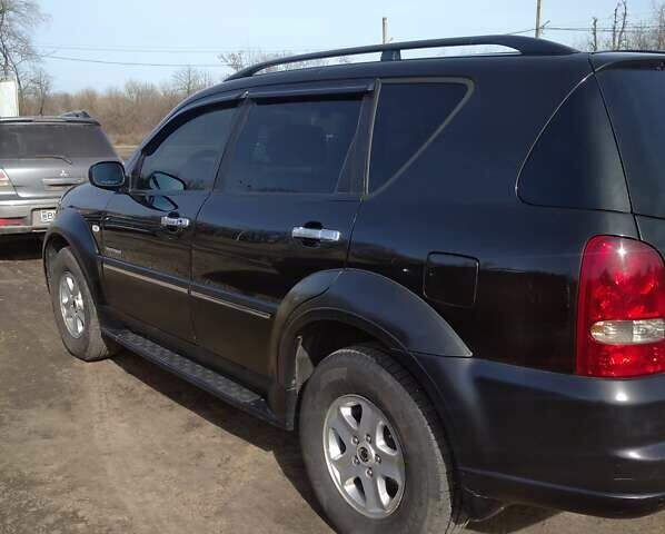 Черный Cанг Йонг Рекстон, объемом двигателя 2.7 л и пробегом 228 тыс. км за 8000 $, фото 1 на Automoto.ua