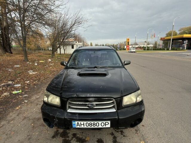 Черный Субару Форестер, объемом двигателя 2 л и пробегом 376 тыс. км за 3900 $, фото 1 на Automoto.ua