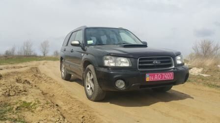 Чорний Субару Forester, об'ємом двигуна 2 л та пробігом 170 тис. км за 7504 $, фото 1 на Automoto.ua