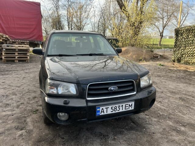 Черный Субару Форестер, объемом двигателя 2 л и пробегом 373 тыс. км за 5050 $, фото 1 на Automoto.ua