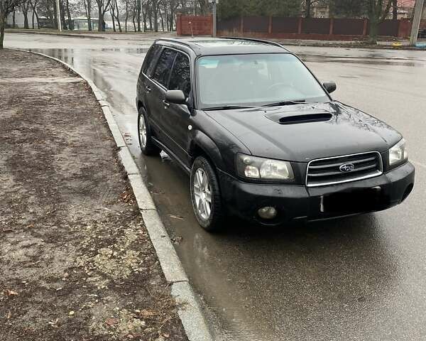Чорний Субару Forester, об'ємом двигуна 2 л та пробігом 285 тис. км за 5500 $, фото 1 на Automoto.ua