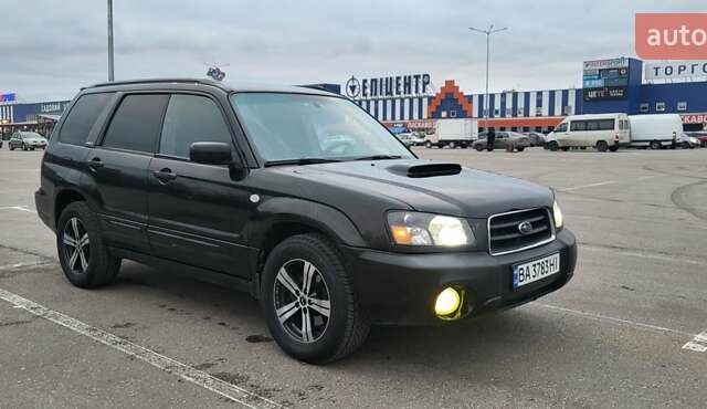 Черный Субару Форестер, объемом двигателя 2 л и пробегом 198 тыс. км за 6000 $, фото 1 на Automoto.ua