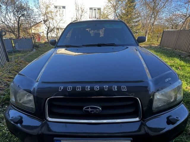 Черный Субару Форестер, объемом двигателя 2 л и пробегом 350 тыс. км за 4999 $, фото 1 на Automoto.ua