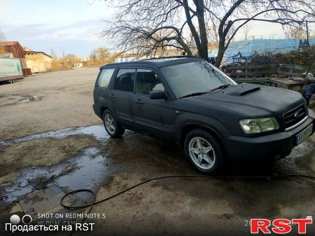 Черный Субару Форестер, объемом двигателя 2 л и пробегом 337 тыс. км за 5000 $, фото 1 на Automoto.ua