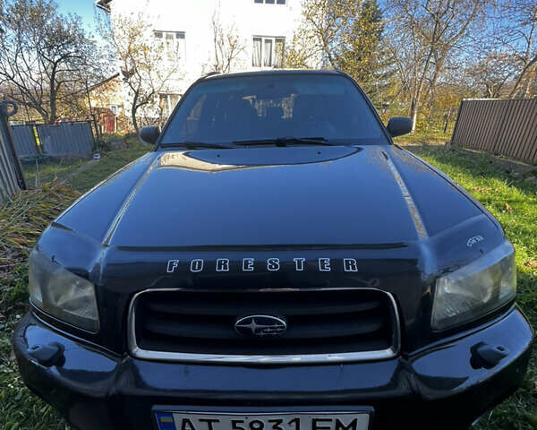 Черный Субару Форестер, объемом двигателя 1.99 л и пробегом 350 тыс. км за 4999 $, фото 1 на Automoto.ua