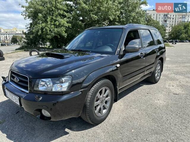 Черный Субару Форестер, объемом двигателя 1.99 л и пробегом 208 тыс. км за 5999 $, фото 1 на Automoto.ua
