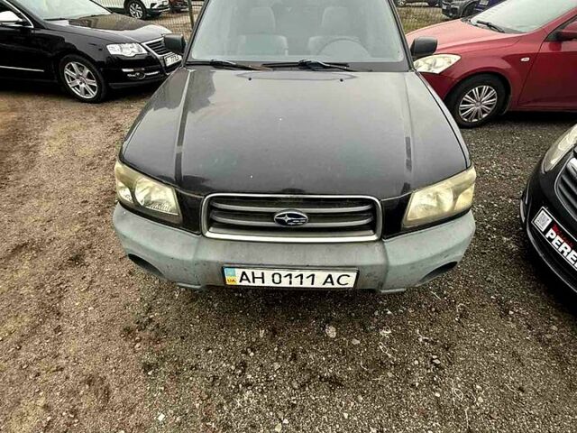 Черный Субару Форестер, объемом двигателя 2 л и пробегом 57 тыс. км за 5500 $, фото 1 на Automoto.ua