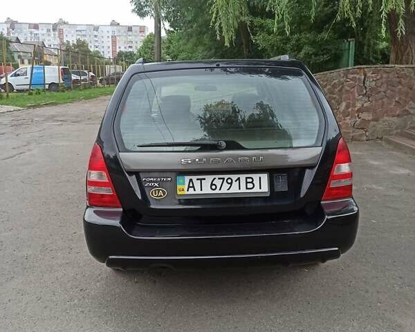 Чорний Субару Forester, об'ємом двигуна 2 л та пробігом 352 тис. км за 5500 $, фото 1 на Automoto.ua