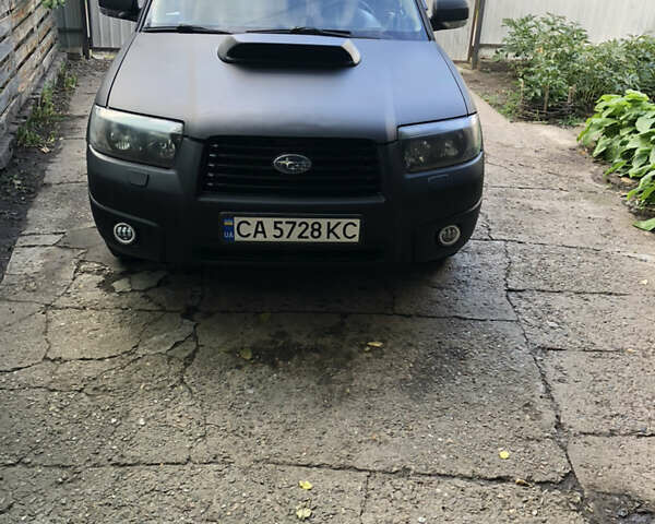 Черный Субару Форестер, объемом двигателя 2.5 л и пробегом 280 тыс. км за 9000 $, фото 1 на Automoto.ua