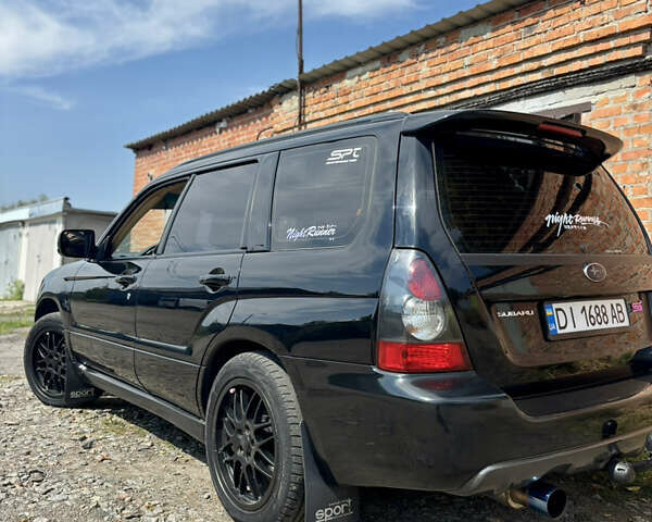 Чорний Субару Forester, об'ємом двигуна 2.46 л та пробігом 288 тис. км за 7900 $, фото 1 на Automoto.ua