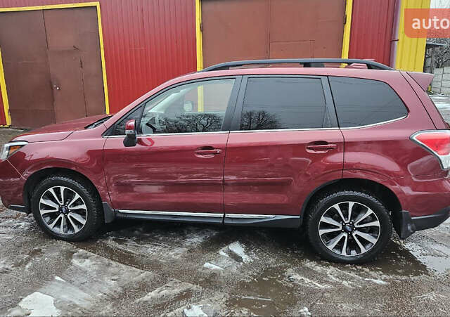 Красный Субару Форестер, объемом двигателя 1.99 л и пробегом 139 тыс. км за 18900 $, фото 1 на Automoto.ua