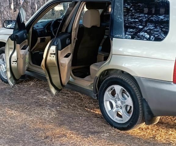 Желтый Субару Форестер, объемом двигателя 2.5 л и пробегом 220 тыс. км за 4700 $, фото 1 на Automoto.ua