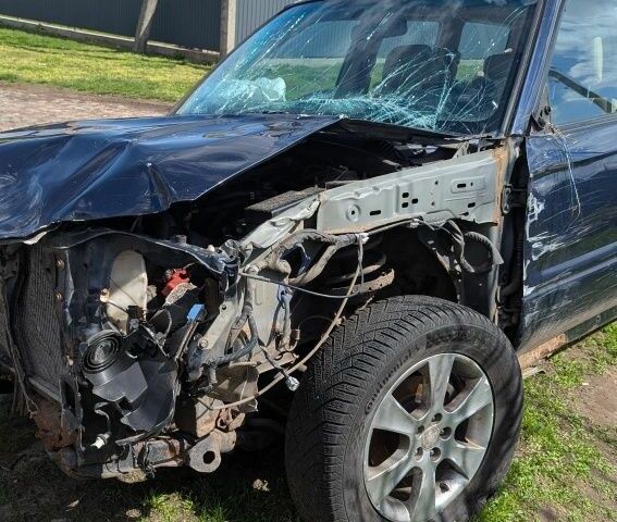 Синій Субару Forester, об'ємом двигуна 2 л та пробігом 285 тис. км за 1500 $, фото 1 на Automoto.ua
