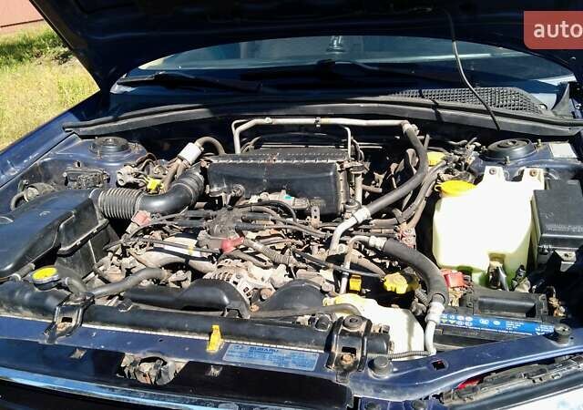 Синій Субару Forester, об'ємом двигуна 2.5 л та пробігом 259 тис. км за 4800 $, фото 1 на Automoto.ua