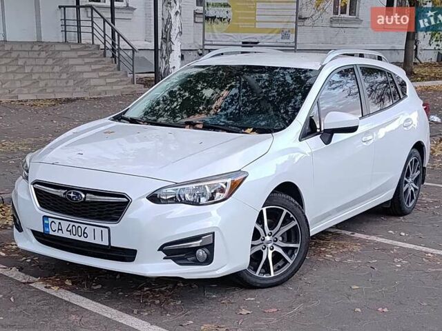 Белый Субару Импреза, объемом двигателя 2 л и пробегом 94 тыс. км за 15000 $, фото 1 на Automoto.ua
