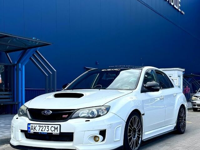 Белый Субару Импреза, объемом двигателя 2.5 л и пробегом 142 тыс. км за 16000 $, фото 1 на Automoto.ua