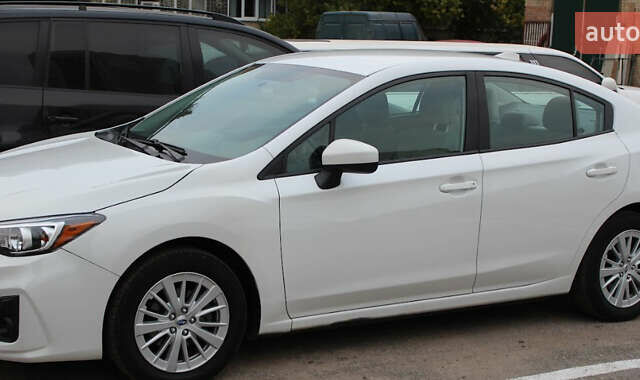 Белый Субару Импреза, объемом двигателя 2 л и пробегом 107 тыс. км за 11000 $, фото 1 на Automoto.ua