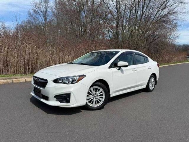 Белый Субару Импреза, объемом двигателя 2 л и пробегом 145 тыс. км за 2100 $, фото 1 на Automoto.ua