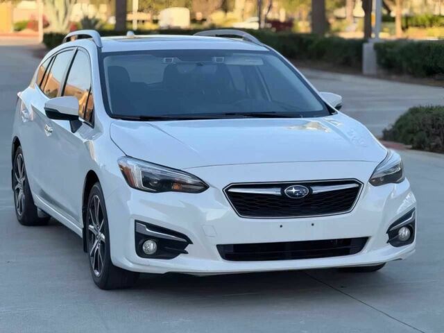 Білий Субару Імпреза, об'ємом двигуна 2 л та пробігом 56 тис. км за 3200 $, фото 1 на Automoto.ua