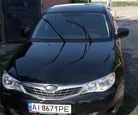 Черный Субару Импреза, объемом двигателя 1.5 л и пробегом 235 тыс. км за 5000 $, фото 1 на Automoto.ua