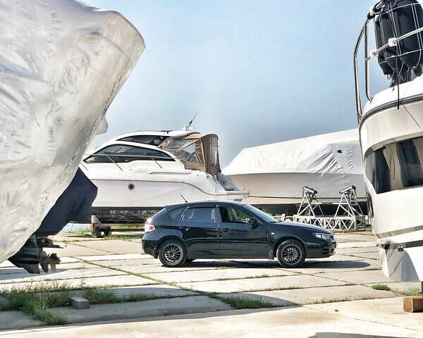 Черный Субару Импреза, объемом двигателя 1.5 л и пробегом 190 тыс. км за 6500 $, фото 1 на Automoto.ua