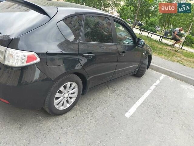 Черный Субару Импреза, объемом двигателя 1.5 л и пробегом 142 тыс. км за 6539 $, фото 1 на Automoto.ua