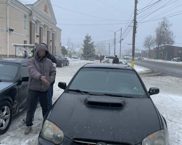 Черный Субару Импреза, объемом двигателя 1.6 л и пробегом 300 тыс. км за 4000 $, фото 1 на Automoto.ua