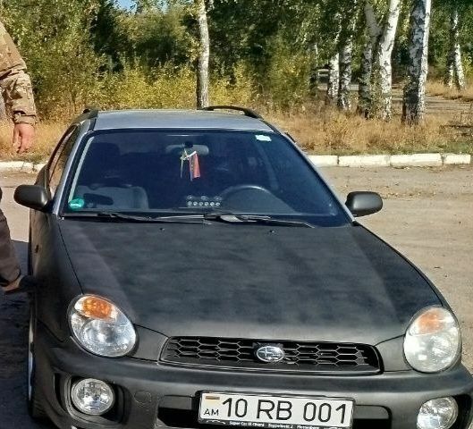 Черный Субару Импреза, объемом двигателя 2 л и пробегом 250 тыс. км за 3481 $, фото 1 на Automoto.ua
