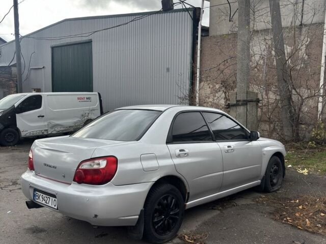 Серый Субару Импреза, объемом двигателя 1.6 л и пробегом 300 тыс. км за 2300 $, фото 1 на Automoto.ua