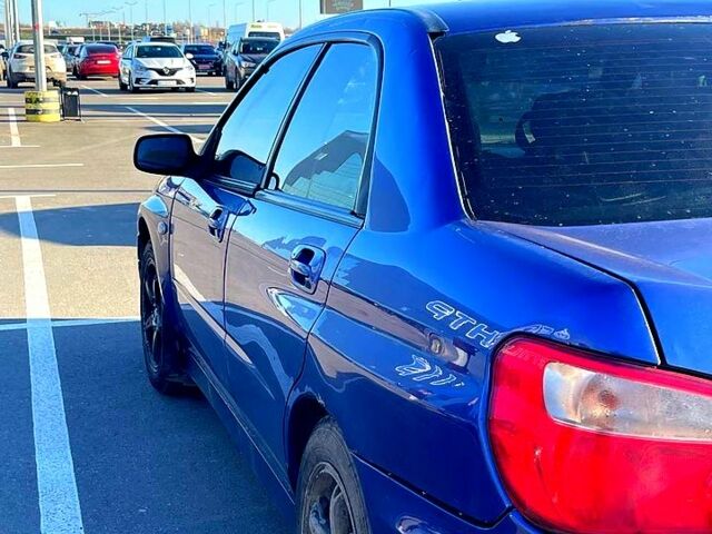 Синий Субару Импреза, объемом двигателя 1.6 л и пробегом 318 тыс. км за 3000 $, фото 1 на Automoto.ua