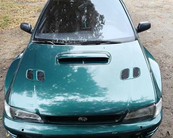 Синій Субару Імпреза, об'ємом двигуна 1.98 л та пробігом 240 тис. км за 8000 $, фото 1 на Automoto.ua