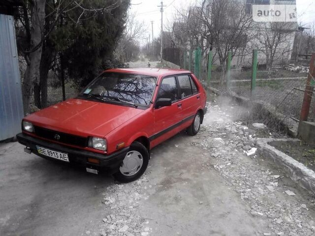 Червоний Субару Джасті, об'ємом двигуна 1.2 л та пробігом 100 тис. км за 1000 $, фото 1 на Automoto.ua