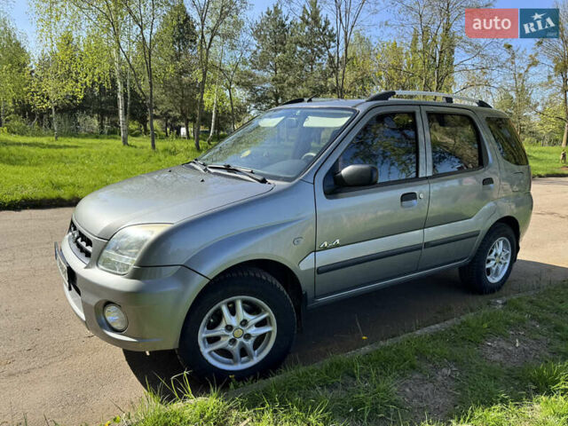 Сірий Субару Джасті, об'ємом двигуна 1.3 л та пробігом 200 тис. км за 5299 $, фото 1 на Automoto.ua